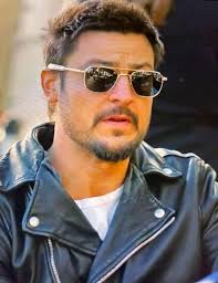 Should I cut my hair and get a face tattoo?