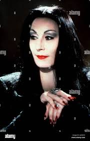 Morticia addams anjelica huston hi-res stock photography and images