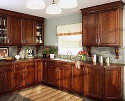Whether you choose to combine gray cabinets and a white countertop or gray lower cabinets and white upper wall cabinets, you simply cannot make a mistake. Pictures Of Kitchens With Cherry Cabinets Cherry Cabinets Kitchen Kitchen Cabinets And Granite Cherry Cabinets