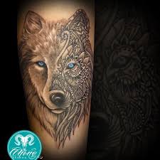 Black And White Wolf Tattoo With Blue Eyes On The White Side Of The Wolf 39 S Face I Think I 39 D Change The Eye Color Other Then That This Is Absolutely Perfect Wolf Tattoos Tattoos Animal Tattoos