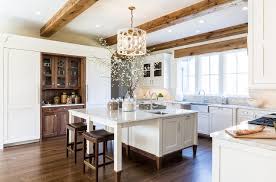 Wood beams in kitchen ceiling. White And Brown Kitchen With Wood Ceiling Beams Transitional Kitchen