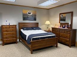 Two bed designs are available, one with a rectangular headboard top and the other with an oval shape, both finished in dark walnut. Maine Discount Furniture Stores Maine Furniture Store Tuffy Bear Discount Furniture Located In Glenburn Maine