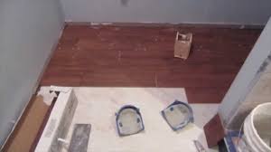 We love the look and durability of tile that looks like wood. How To Install A Wood Look Porcelain Plank Tile Floor Youtube