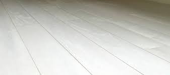 The whitewashing gives a nice touch of color while still showing the graining and natural beauty of the wood. White Washed Oak