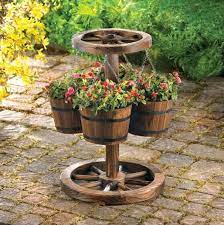 Outdoor Garden Decor Beautiful Garden And Outdoor Decor Outdoor Garden Decorations In 2020 Rustic Planters Wood Barrel Planters Garden Decor