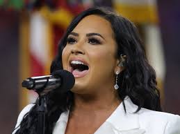 See more of demi lovato on facebook. Super Bowl 2020 Demi Lovato S National Anthem Performance Hair Makeup And Tan Allure