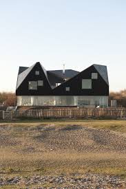 It's also a good idea to consider the practicalities of getting the materials on site. Dune House Crushes The Glass With Its Hybrid Roof Design Looks Like A Bold Hat