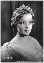 From Cartier in 1937, a similar halo-atyle tiara, this time set with  diamonds
