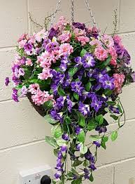 Cute artificial hanging baskets allow you to create a look of fresh flowers and greenery without having to worry about watering or removing spent blossoms. 16 Hanging Basket Artificial Outdoor Flowers Purple Pink
