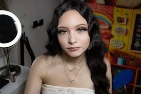 What is a good affordable portrait lens for a Canon 77D?