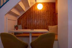 Table Under The Stairs Dining Booth Ceiling Beams Living Room Stairs In Kitchen