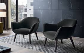Create an inviting atmosphere with new living room chairs. Modern Armchairs Italian Furniture Poliform