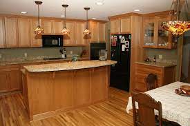 Pin By Patricia Arcand On For The Home Honey Oak Cabinets Wood Floor Kitchen Oak Kitchen