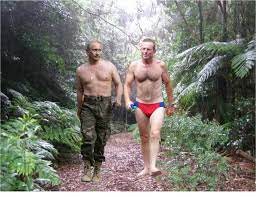 Putin jokes with a judo banker: Putin And Abbott Bond Over Bare Chested Tiger Wrestling The Shovel