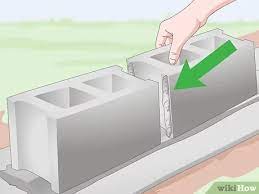 When the wall is cinder block, though, it can be a challenge to make those things stick. How To Build A Cinder Block Wall With Pictures Wikihow
