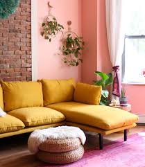 The ability to remove and wash (and even replace, if absolutely necessary) the covers was a huge plus for us, especially with such a light colored fabric. Ready To Go Bold In Your Living Room Here S The Bright Yellow Sofa Of Your Dreams Tfdiaries