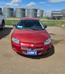 Image result for Dark Garnet Red 2002 Stratus