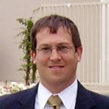 Dr. Erik Root Joins The Roger Bacon Academy -