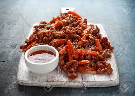 Simple step by step instructions on how to make crispy chilli beef chinese / cantonese style. Crispy Shredded Beef With Carrots And Sweet Chilli Sauce On White Wooden Board Chinese Takeaway Food Stock Photo Picture And Royalty Free Image Image 119397480