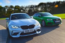 From the impressive bonnet to its muscular rear design, its familiar silhouette is. Bmw M2 Competition Vs Audi Rs 3 Saloon Auto Express