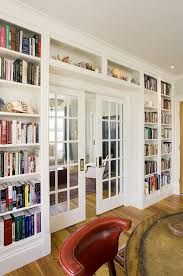 Bookcases From The Laundry Area All Around To The Bedroom Door I Like The Glass Pocket Doors Although I Think There Is On Home Library Design Home New Homes