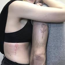 Couple tattoos are a unique way to say, i am serious about this relationship, because they are forever. Matching Flower Tattoos
