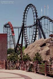 The higher the initial point, the longer the path. Demon Six Flags Great America Gurnee Illinois Usa Roller Coaster Water Park Rides Theme Parks Rides