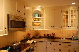 The large open storage space at the center is to store your microwave. Feature Corner Display Cabinet Traditional Kitchen Philadelphia By Kevin Martin