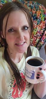 Enjoying coffee in the sunshine with my kids