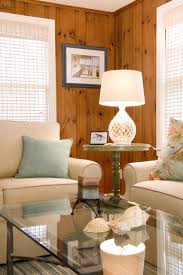Updated Knotty Pine Room With White Furniture Window Treatments And White Trim Knotty Pine Living Room Cottage Living Rooms Knotty Pine Paneling