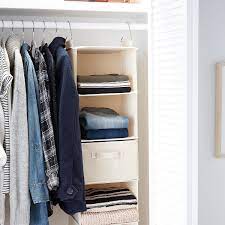 Our selection of hangers alone is impressive, with contoured. 6 Compartment Canvas Hanging Sweater Organizer The Container Store