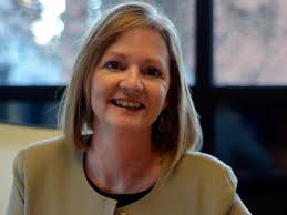 WHO'S RUNNING THIS TOWN? REDI President Stacey Button enjoys Missouri  antiques, family