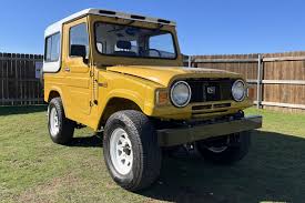 Image result for Medium Yellow 1965 Daihatsu
