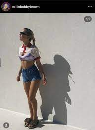 Millie Bobby Brown shadow looks like Mike wearing a jacket with a piece of  straw in his mouth : rokbuddychicanery