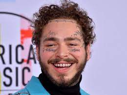 Post Malone Is Beyond Recognition With Face Tattoos Long Hair Photoshopped Out Face Tattoos Post Malone Long Hair Styles