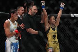 Carla Esparza (gold singlet) vs. Lynn Alvarez