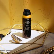 Dark brown/black, red, light brown, dark blonde, blonde. Oribe Airbrush Root Touch Up Spray Blonde