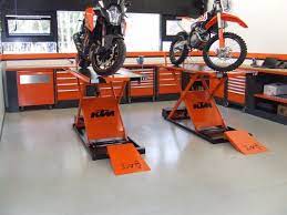 Ktm Husqvarna Motorcycle Brands Lv8 Elevate Sorbolo Garage Design Interior Motorcycle Workshop Motorcycle Garage