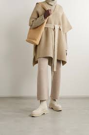 Maybe you would like to learn more about one of these? Beige Tabard Belted Knitted Poncho Lauren Manoogian Net A Porter