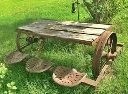 How About This Rustic Wagon Wheel Wood Picnic Table With Tractor Seat For The Back Roads Living Yard Art Old Farm Equipment Picnic Table