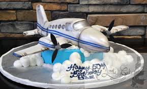 A bad seatmate can turn a pleasant flight into purgatory. Airplane In Clouds Birthday Cake