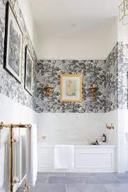 Medium gray subway tiles and stainless steel pieces deliver a masculine vibe to the bathroom. Timeless Bathroom Ideas To Inspire Your New Scheme