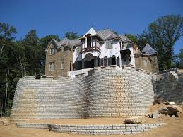 How to build a diy fire pit for only $60 • keeping it. Redi Rock Retaining Wall Makes Beautiful Estate Possible