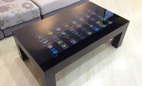Very Nice Four Leg Coffee Table With Smooth Glass Top Featuring A 42 Hd Capacitive Touchscreen This Impressive Table Compliments Smart Table Home Tech Decor