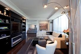 A rich chocolate tv panel takes the limelight of the living room. Modern Tv Room Houzz