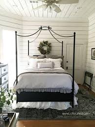 This farmhouse master bedroom pulls it off by pairing a sliding barn door and weathered bench with sleeker furnishings, like a midcentury modern pendant light. Modern Farmhouse Staple Antique Black Bed Part 1