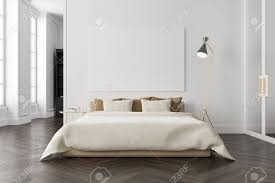 When you choose wooden floors for your master bedroom, you can create a unified look by. White Bedroom Interior With A Dark Wooden Floor A Master Bed Stock Photo Picture And Royalty Free Image Image 92614593