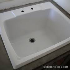 Maybe you would like to learn more about one of these? One Room Challenge Laundry Room Week Three Laundry Room Painting Plastic Laundry Room Sink