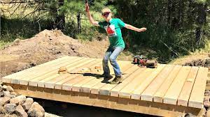 Both aim to create a structure that will allow you to easily access the part of the property that is on the other side of the creek or ditch. How To Build A Bridge Over A Creek For A Tractor 6 Youtube