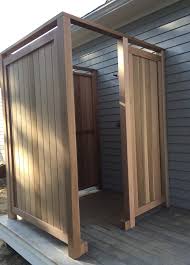 Outdoor showers are easy to install and may require nothing more than a garden hose. Outdoor Showers